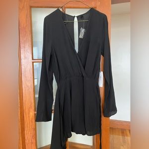 Never worn before Black Romper with Skort bottom